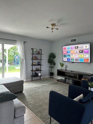 Living area - Backyard Paradise with Heated Pool, Putt Golf and Yard Games. (Mesa)