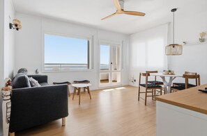 Living area - Penthouse with sea views, two bedrooms with direct access to the coastal path (roses)