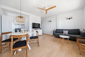 Living area - Penthouse with sea views, two bedrooms with direct access to the coastal path (roses)