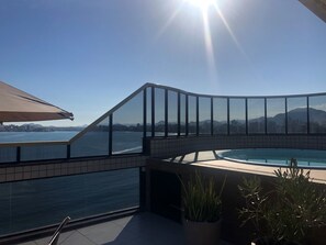 Outdoor pool - Cobertura Linear no canto nobre da Praia em frente ao Morro da Pescaria 4Quartos (Praia do Morro Guarapari)