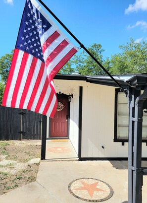Exterior detail - This is a cozy Military/USA themed home by Lackland AFB . 4 Bedroom, 1 Bath. (San Antonio)