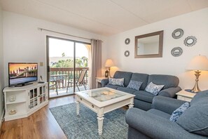 Living area - Beach Dreaming ~free Activities~oceanside~resort Amenities 2 Bedroom Condo by RedAwning (St. Augustine)