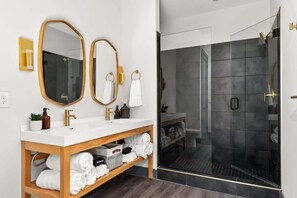 Shower, hair dryer, towels, soap