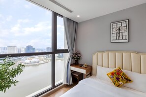 Business Apartment, 2 Bedrooms, Balcony, City View | Premium bedding, pillow-top beds, individually decorated - Vinhomes D'Capitale - Quylodge (Hanoi)