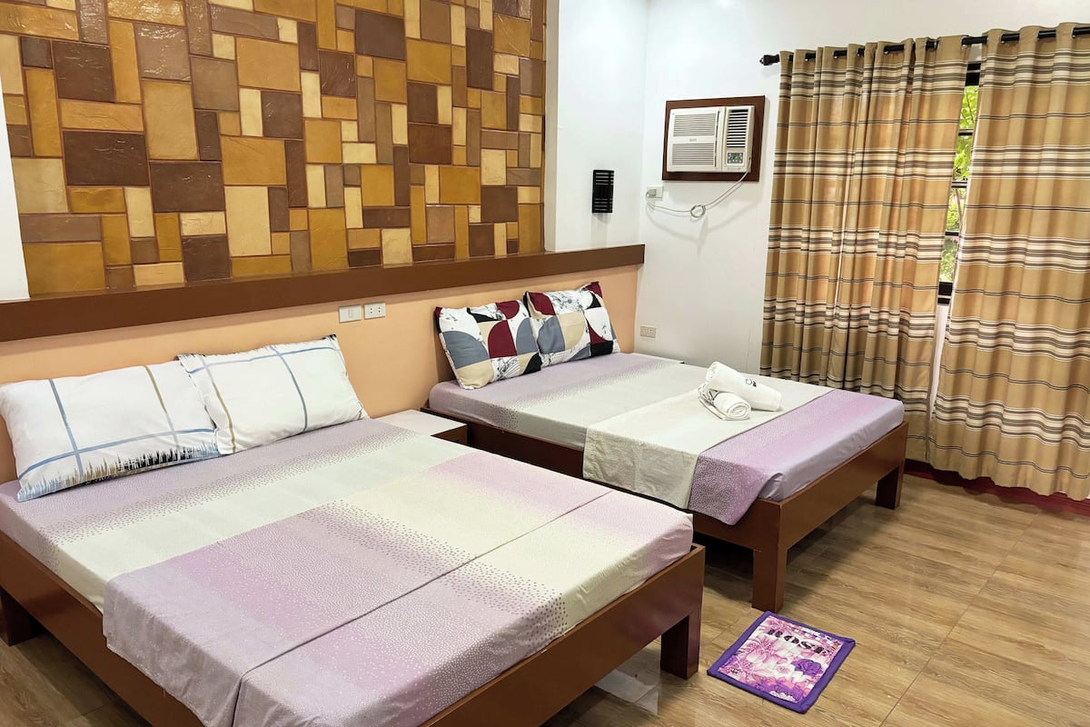 Standard Quadruple Room | 1 bedroom, desk, rollaway beds, bed sheets