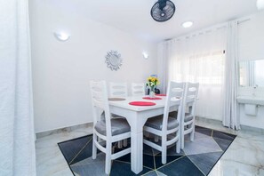 Family Villa | Living area | 24-inch Smart TV with digital channels - Lux Suites Nyali Holiday Villa (Mombasa)