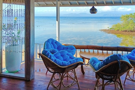 Villa, 2 Bedrooms, Beachfront | Living area | Flat-screen TV