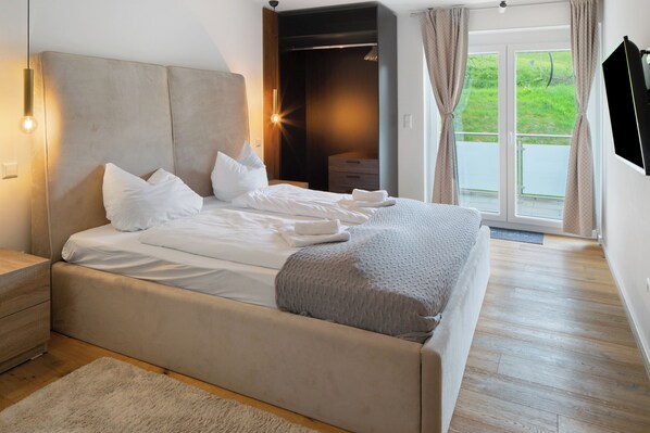 2 slaapkamers, een strijkplank/strijkijzer, gratis wifi, beddengoed