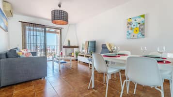 Standard Apartment, Multiple Bedrooms, Mountainside (Sunny Tranquility With Pool) | Living area | 32-inch Smart TV with cable channels