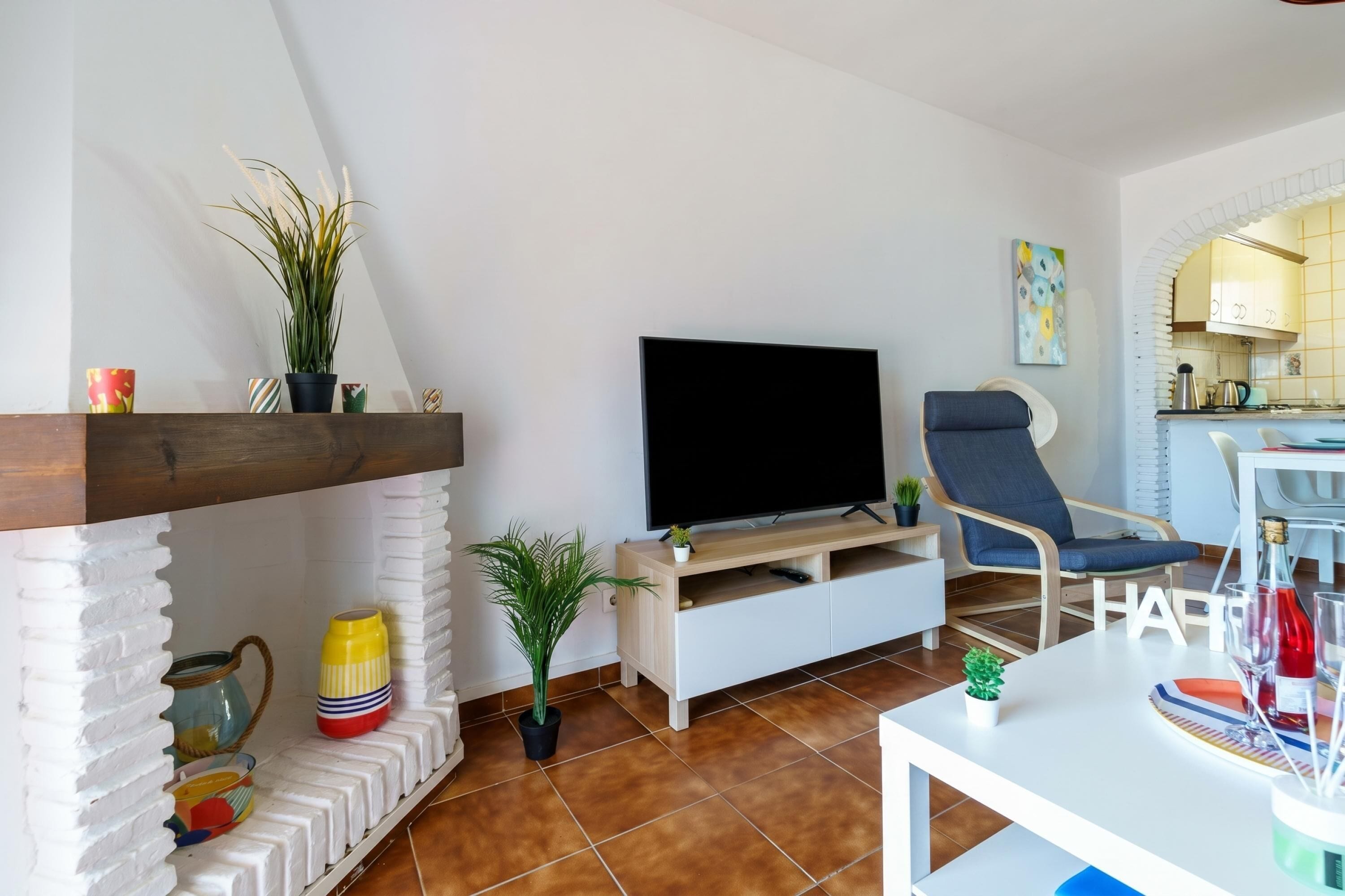 Standard Apartment, Multiple Bedrooms, Mountainside (Sunny Tranquility With Pool) | Living area | 32-inch Smart TV with cable channels