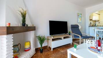 Standard Apartment, Multiple Bedrooms, Mountainside (Sunny Tranquility With Pool) | Living area | 32-inch Smart TV with cable channels
