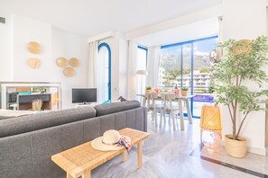 Family Penthouse, Multiple Bedrooms, 2 Bathrooms, Sea Facing (Marbella Pool House PH39 On Sea Shore) | Living area | 21-inch flat-screen TV with cable channels - Marbella House (Marbella)