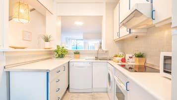 Family Apartment, Multiple Bedrooms, 2 Bathrooms, Sea Facing (Marbella Pool House GF44 On Sea Shore) | Private kitchen | Fridge, microwave, oven, stovetop