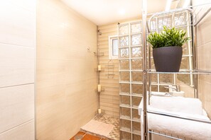 Shower, towels, soap, shampoo