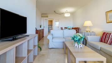 Standard Apartment, Multiple Bedrooms, 2 Bathrooms (La Paloma With Pool) | Living area | 21-inch Smart TV with cable channels