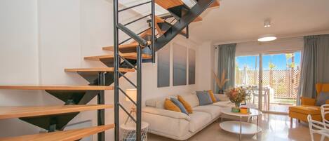 Family Apartment, Multiple Bedrooms, 2 Bathrooms, Mountainside (Family Duplex Riviera With Pool) | Living area | 21-inch flat-screen TV with cable channels