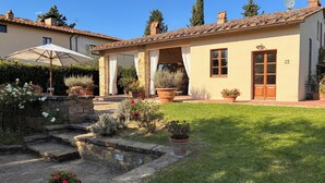 A house with a tiled roof, stone steps, and potted plants. - Dante Country House - House with Private Pool and Jacuzzi between Florence and Chianti (Toscana)