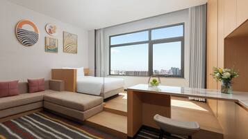 Premier kamer | Donsdekens, een minibar, gratis wifi, beddengoed