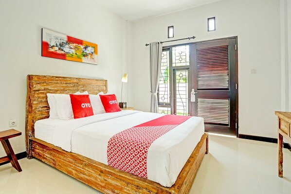 Deluxe Double Room | Free WiFi, bed sheets - OYO 91123 Madhava 108 (Kutuh)