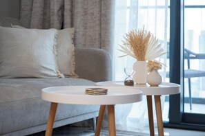 Deluxe Apartment, 1 Bedroom, Lake View | Living area | 50-inch Smart TV with digital channels