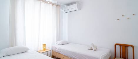 2 habitaciones, tabla de planchar con plancha y wifi gratis