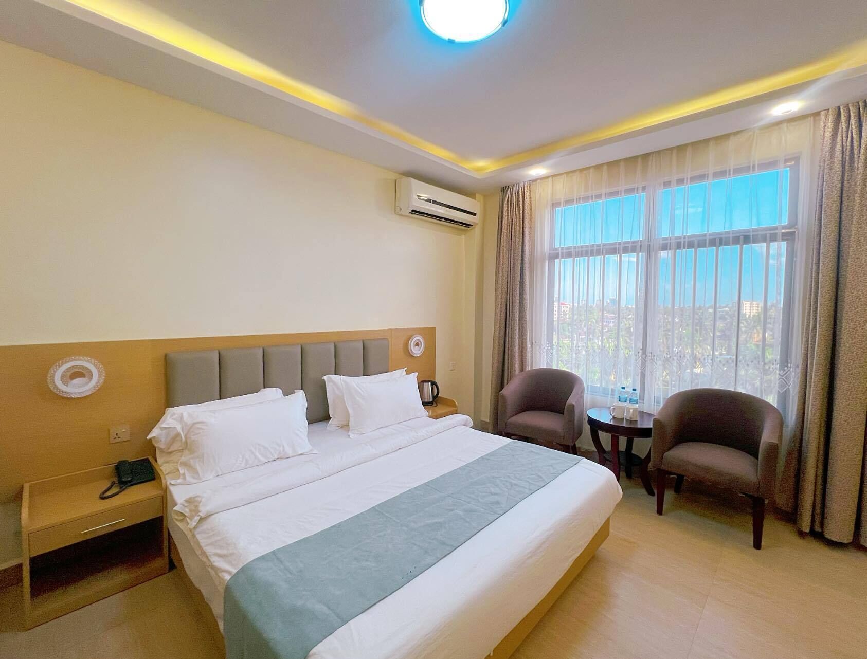 Desk, laptop workspace, free WiFi, bed sheets