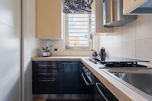 Apartment | Private kitchen | Fridge, oven, stovetop, dishwasher