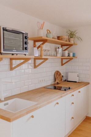 Réfrigérateur, four, plaque de cuisson, lave-vaisselle