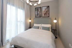 Leilighet – deluxe, byutsikt | 1 soverom, sengetøy av topp kvalitet, dundyner og memory foam-senger