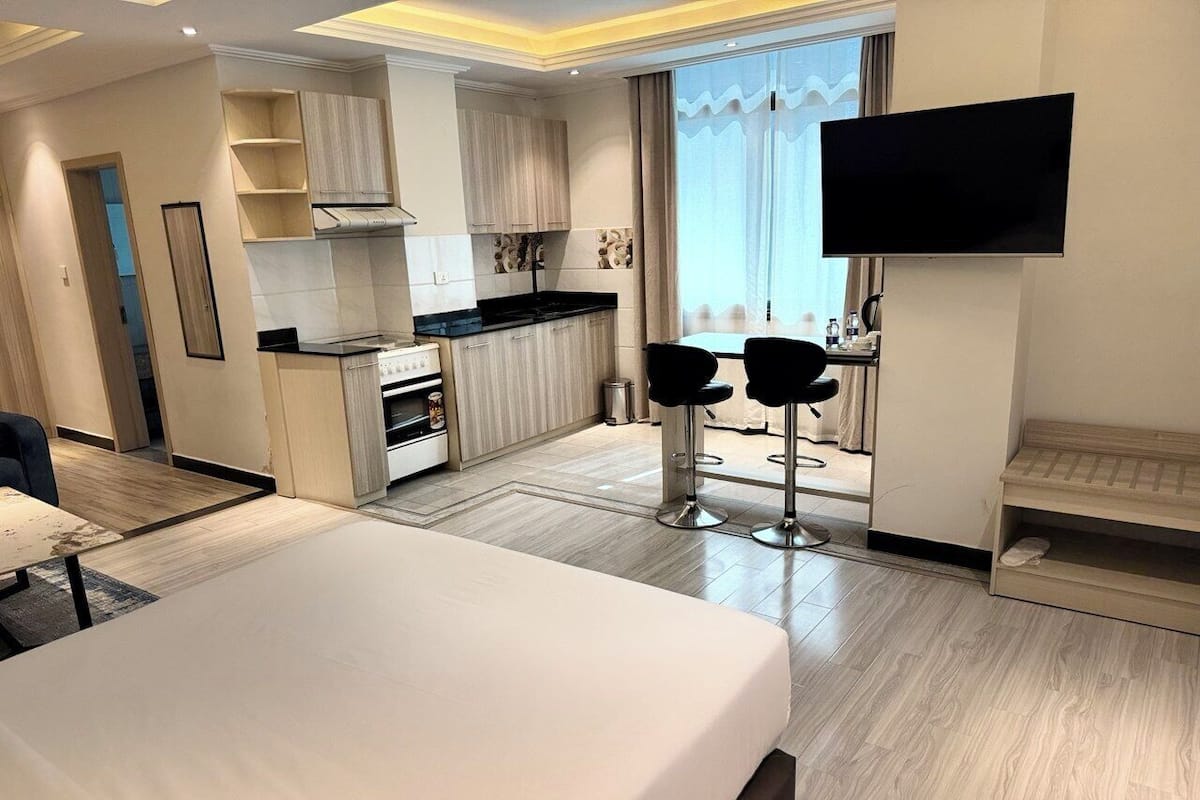 Suíte estúdio júnior | Cofres nos quartos, cortinas blackout, ferros/tábuas de passar roupa