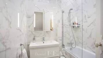 Hair dryer, towels, soap, shampoo