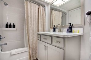Shower, hair dryer, towels - Oceanfront Escape Renovated Suite at Camelot (Myrtle Beach)