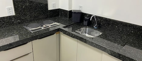 Fridge, microwave, stovetop, coffee/tea maker