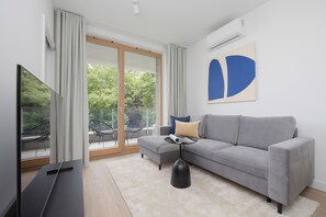 Apartment, 1 Schlafzimmer, Balkon | Wohnzimmer