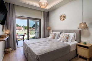 Deluxe Apartment, 1 Bedroom, Garden View | In-room safe, blackout drapes, iron/ironing board, free WiFi - Phos Elegant Residences by Konnect, 400m to the beach (Corfu)