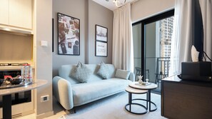 Appartement Deluxe, vue ville | Coin séjour