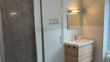 Shower, hair dryer, soap, shampoo