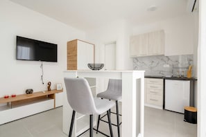 Refrigerador, placa de cocina