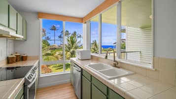 Condo, 1 Bedroom | Private kitchen | Dishwasher, cookware/dishes/utensils