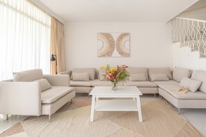 Family Townhome, Multiple Bedrooms, 2 Bathrooms (Casa limonero Miraflores) | Living area | 21-inch flat-screen TV with cable channels, fireplace - Casa Limonero Miraflores (Mijas)