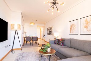 Family Apartment, Multiple Bedrooms, 2 Bathrooms, Mountainside (Sunset Golf International) | Living area | 21-inch flat-screen TV with cable channels - Sunset Golf International (Estepona)