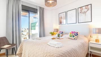 Family Apartment, Multiple Bedrooms, 2 Bathrooms, Mountainside (Sunset Golf International) | 2 bedrooms, laptop workspace, free WiFi, bed sheets