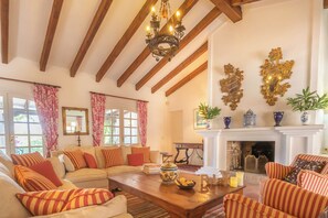 Family Villa, Multiple Bedrooms, Lakeside (Cortijo Villa Padierna El Lago) | Living area | 32-inch Smart TV with cable channels - Cortijo Villa Padierna El Lago (Benahavis)