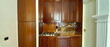Stovetop, toaster, dining tables