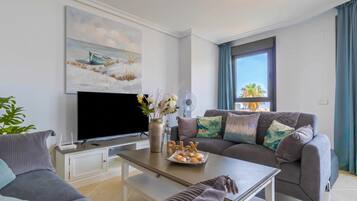Family Apartment, Multiple Bedrooms, 2 Bathrooms, Mountainside (Sunset Golf Elegance) | Living area | Flat-screen TV