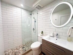 Shower, hair dryer, towels
