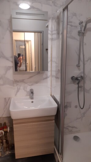 Hair dryer, towels, soap, shampoo