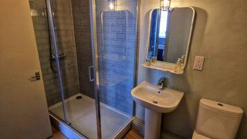 Shower, free toiletries, towels, soap