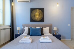 3 slaapkamers, een strijkplank/strijkijzer, gratis wifi, beddengoed