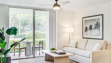 Deluxe Apartment, 3 Bedrooms (Self Check-in with Virtual Front Desk) | Living area | Flat-screen TV